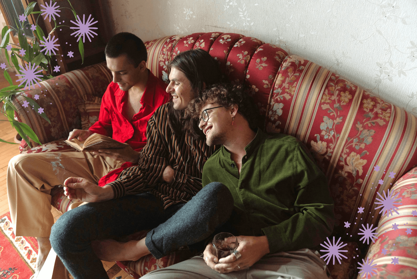 Group of People Reading and Discussing Books on a Couch